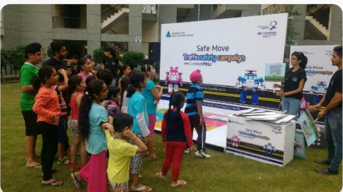 Apartment activation with kids playing games on grass outdoors