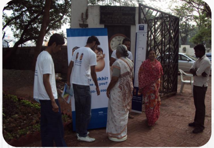 Joggers park activation with group of people standing and talking