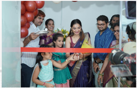 Store launch event with ribbon cutting and people smiling